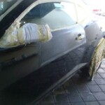 Photographs of a 2014 Chevrolet Camaro that was in an accident and repaired by Elite Paint & Body Shop in West Palm Beach Florida